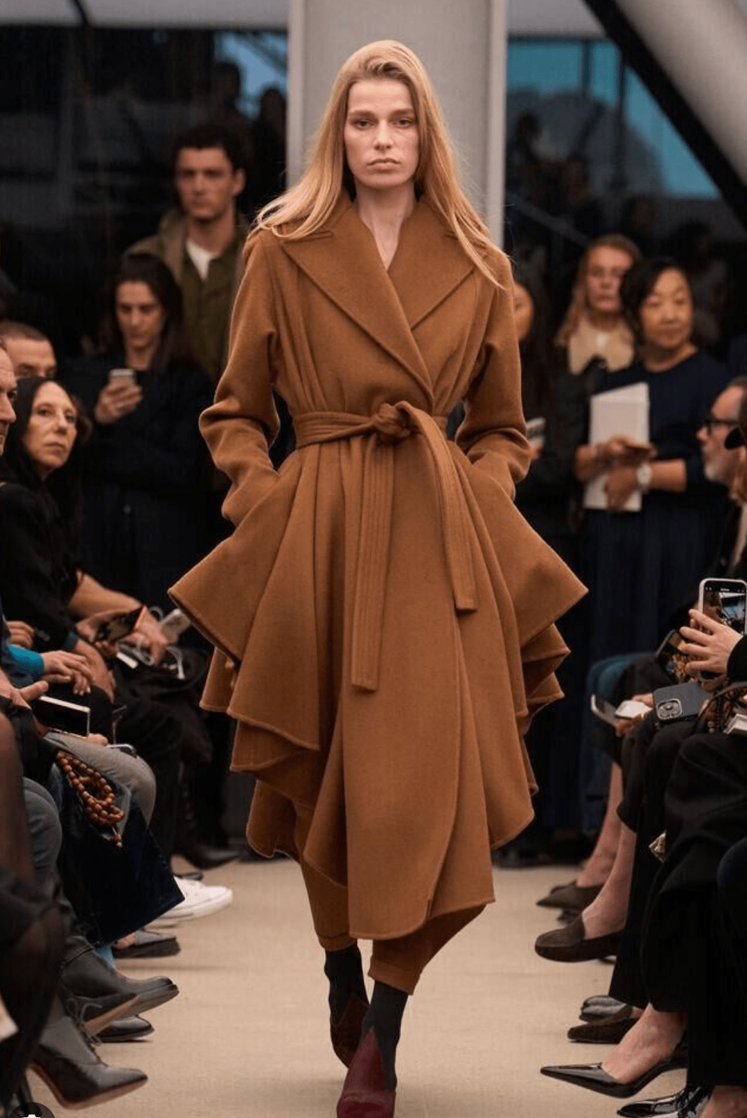 Céline Dion Wore an Asymmetric Caramel Alaïa Trench Coat and Cutout Suede Boots in Paris